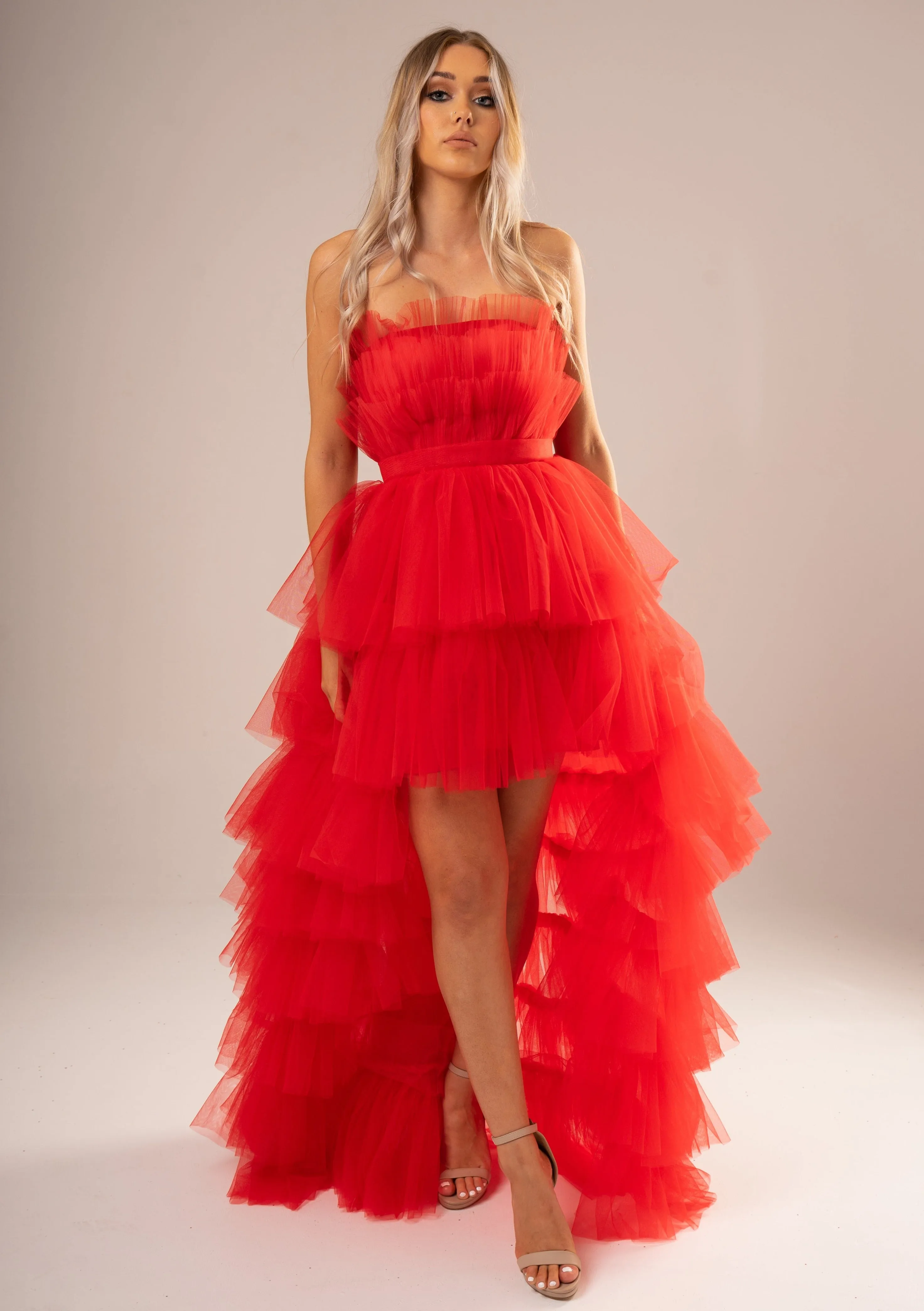 Red pleated layered high and low tulle dress for hire